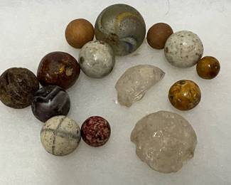 Early Glass and Clay Marbles in Varying Colors and Sizes