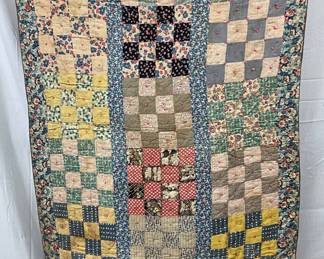 Patchwork Quilt with Flour Sack Fabrics and Plaid Homespun Backing