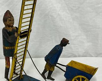 Two Early Wind-Up Tin Toys: Climbing Figure with Ladder and Wheelbarrow Pusher