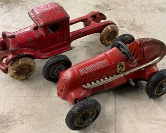 Two Early Rubber-Wheeled Kids’ Toy Vehicles in Red
