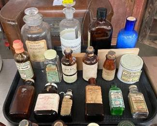 Early Medicine Bottles with Labels and Glass Stopper Features