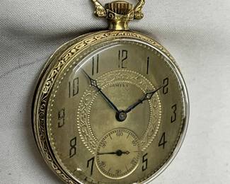 Inner case cover marked “14K Gold 552165.”