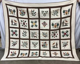 Handmade Quilt with Botanical and Folk Art Motifs