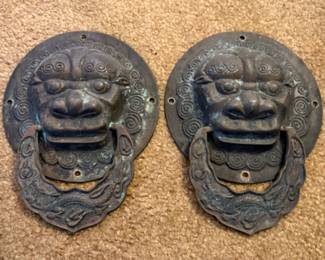 a pair of antique Chinese bronze door knockers