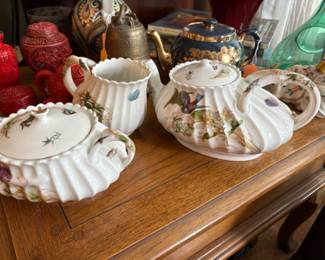 a beautiful 1930s Haviland tea set painted with birds and flowers