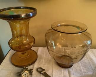 Vase on the right is a Steuben amber vase……rose pattern