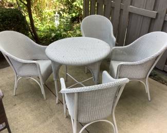 Wicker table and four chairs…..