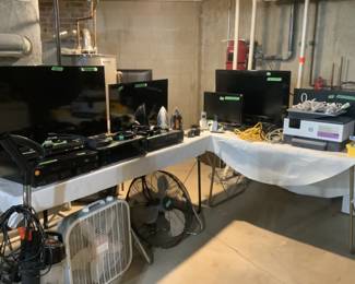 Electronics….flat screen TVs, fans, DVD players, plus irons and ironing board.