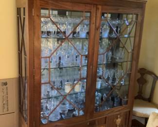 Antique gorgeous display cabinet with an inlay. Measures 52” wide x 16” d x 70” high.  Presale price $495