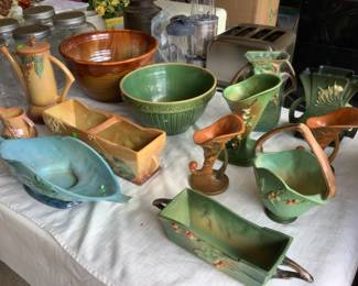 Wonderful collection of Roseville vases, baskets, teapot
