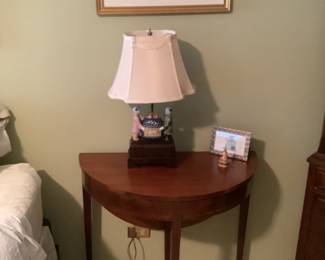 Drop leaf table and lamp..table measures 32 w x 16 d x 29 h.   Presale $75