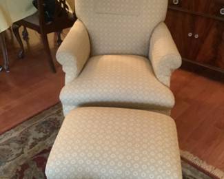 Upholstered chair and ottoman in cream.  Measures 28” w x 30” d x 40h. In terrific condition.  Presale $185