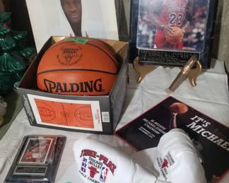 Michael Jordon collection.  Limited edition basketball …world champ ball…2000 made.  Also books on Jordan, championship hats, plaque with picture.