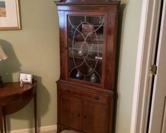 Duncan Phyfe style  corner display cabinet measures 30 w x 24 d x 74 h.  Presale $150.
