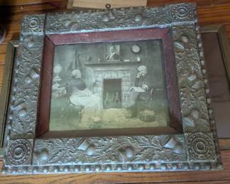 Lots of antique photos, maps, picture frames, and really cool antique prints