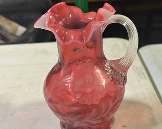 Ornate glass pitcher