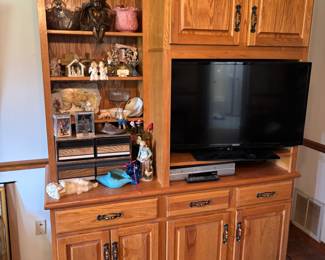 Wood Entertainment Cabinet 
62”w 25”d 84”t TV space 33”w 23”t fit 37”TV. $ 250.00
Samsung 37”TV $ 75.00
Sony VHS/ DVD player $ 35.00