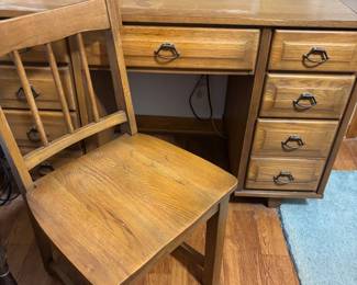7 drawer wooden desk with chair
Desk: 46.5”w 22.5”d 30.5”t
Chair: 17.5”w 16”d 32”t.  $ 95.00 set
