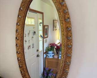 Oval gold framed beveled mirror
25”w 46”t.    $ 85.00