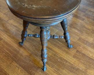 Antique glass ball footed piano stool.
14.5” diameter 19” t.    $ 125.00