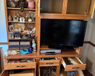 Wood Entertainment Cabinet 
62”w 25”d 84”t TV space 33”w 23”t fit 37”TV. $ 250.00