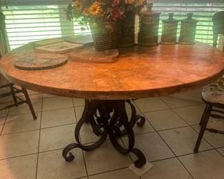 SOLID STONE AND VERY HEAVY. COULD BE USED OUTSIDE.