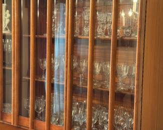 Absolutley stunning china cabinet! Solid wood and features unique rounded wood detailing on the front of cabinet