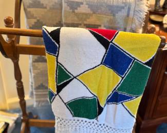 quilt rack and vintage towel