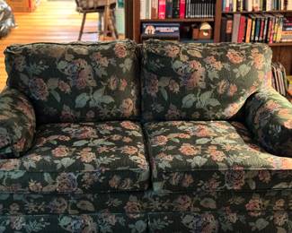 Beautiful matching loveseat and sofa in a black floral print