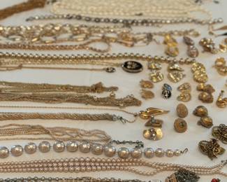 metals all a mix in chains earring and bracelets