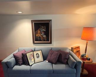 vintage sleeper sofa and tiger on black velvet