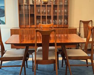 Gorgeous retro MCM dining set with very unique features. Solid wood