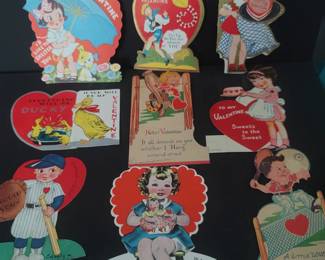 I have over 100 Valentines as well astravel brochures, maps, postcards, written music, postcards and more.