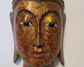 This is a Handcarved Buddha Head, Thai made at least 60byears ago. I have a handcarved Shiva, a balinese Gong man and a 4' antique Balinese gold leafed buddha. Ask me about that one if interested. I won't sell that one for under $2800.