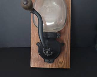 This is an antique coffee grinder, I have a couple of these, a vintage nut grinder, a butter jar churned, meat grinder, lots of kitchen stuff