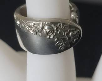 This is a sterling spoon ring I made myself. I make necklaces, earrings and rings from vintage silverware including souvenir spoons.