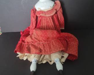This is a Dolly Madison Lowbrow doll made in Germany. I have several German porcelain dolls as well as tiny bisque dolls, ethnic dolls, doll heads etc.