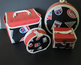 This is the cutest. It's a 1950s United Airlines toy luggage set!