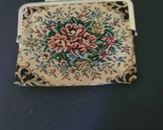 Circa 1930 tapestry clutch. I have several purses.