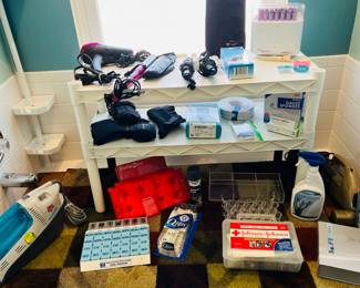 Bathroom essentials, hairdryer, curler, dirt double vacuum