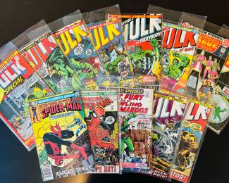 Vintage Marvel comic books, featuring The Incredible Hulk, The Amazing Spider-Man and Nick Fury.