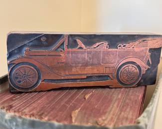 detail of the antique print maker block from newspaper