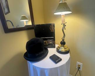 Vintage mens top hat and little iron table lamp