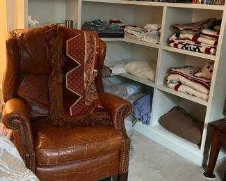 Leather chair, movies, linens