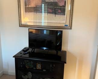 Painted chest, artwork, television