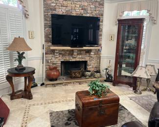 Glass front cabinet, decor, television 