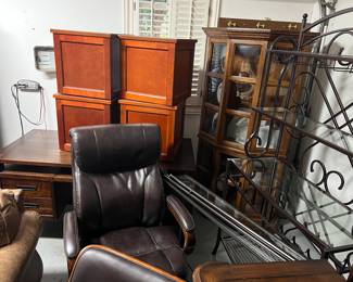 Corner cabinet, baker’s rack, rolling storage bins, desk, lazyboy office chair 