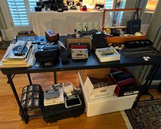 Designer frames for glasses, wallets, Prada, Bally