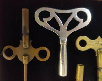 Antique wind up clock and toy keys