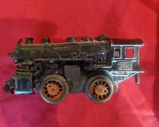 American flyer train engine.  lots of train cars and accessories as well